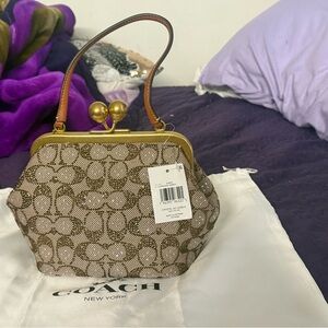 Coach Gold and Brown Signature Clutch